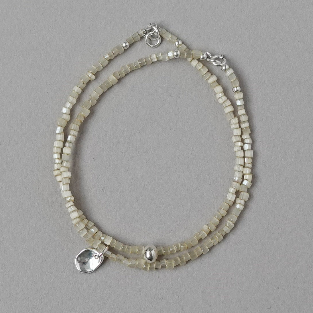 Beaded Bracelet with Fragment Charm